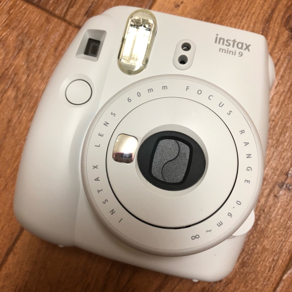 White Instax 9 Mini Polaroid Camera